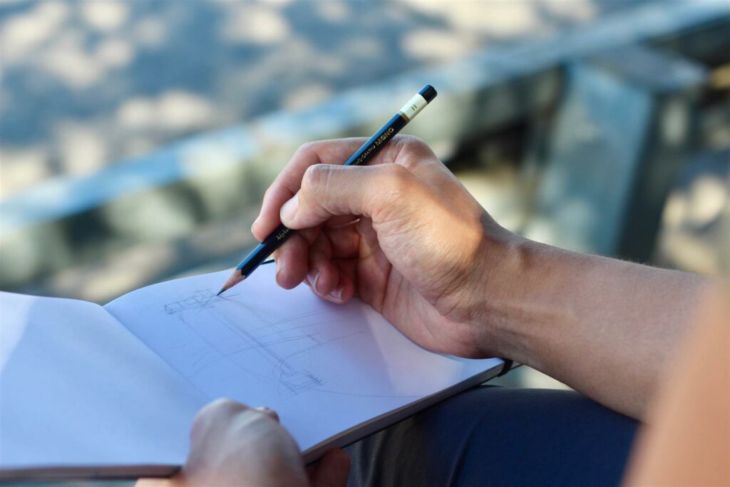 Graphic artist creating a logo