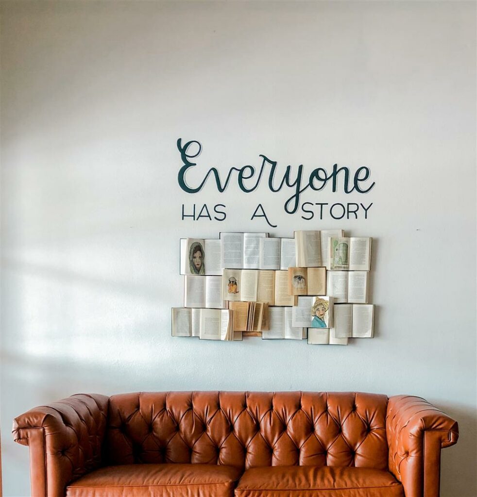 Couch and Artwork stating everyone has a story